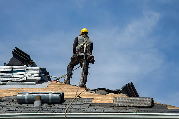 Professional Roof Replacement technician working in Lima, NY